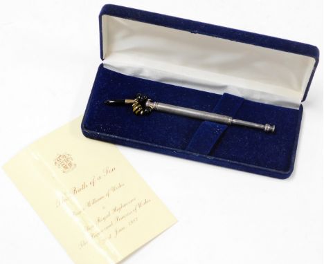 A silver lace making bobbin, with inscription of Prince William of Wales 21st June 1982, with beaded end, boxed in presentati