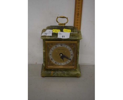 A mantel clock in onyx case, retailed by Mappin &amp; Webb with Elliott block