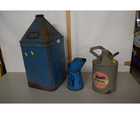 A group of three vintage oil cans and a paraffin can by Aladin, together with a further large pink paraffin can