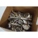 Box containing a quantity of plated cutlery