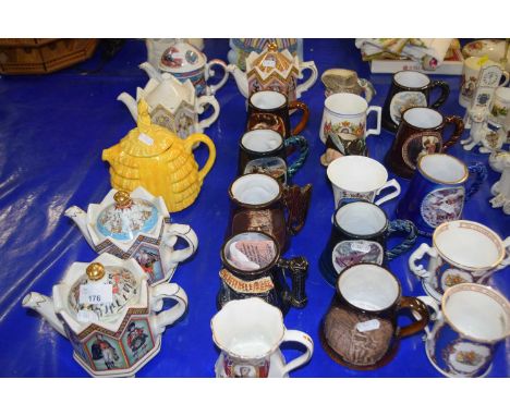 Group of ceramic collectors teapots by Sadler together with collection of various pottery mugs including two small Royal Doul