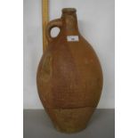A large stone ware flagon indistinctly marked, 48cm high