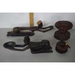 Box containing various wooden ornaments and a wooden fishing reel