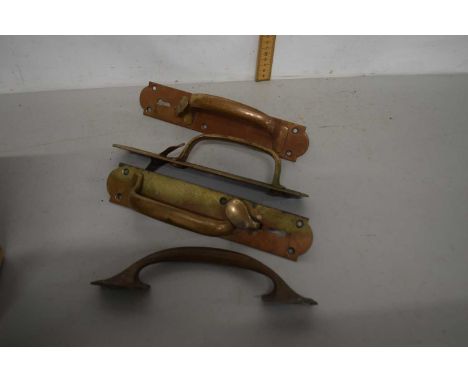 Box containing a quantity of vintage door handles