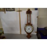 Mid 20th Century carved light oak wheel barometer retailed by Aldred & Son, Yarmouth, 86cm long