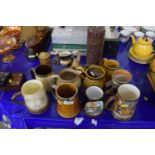 A quantity of pottery jugs, Falcon ware, Beswick etc