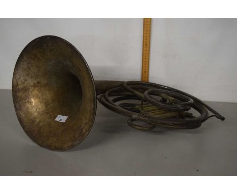 A vintage metal horn instrument