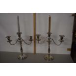 A pair of silver plated candelabra