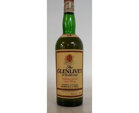 GLENFIDDICH PURE MALT
Glenfiddich Pure Malt Over 8 Years Single Malt Scotch Whisky.  OB.  26 2/3 Fl. Ozs.  70 degrees proof. 