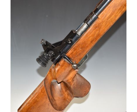 Anschutz model 1410 Match 54 .22 bolt-action target rifle with chequered thumb hole grip, raised cheek piece, adjustable butt