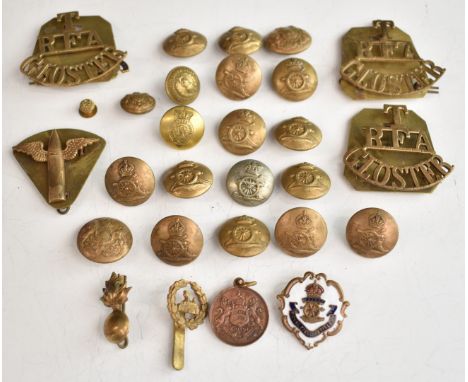 Three WW1 Royal Field Artillery Territorial 'Gloster' brass shoulder titles/badge together with a brass and enamel RFA sweeth