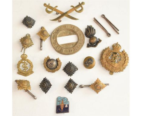 Small collection of metal Army badges and rank insignia, including Royal Engineers, Royal Artillery etc