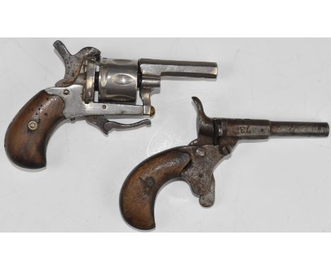 Two .22 blank firing pistols comprising a six-shot revolver with folding trigger and 1.75 inch octagonal barrel, overall leng