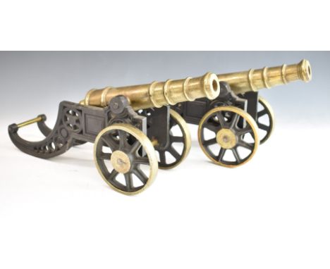 Pair of model cannon with cast brass barrels, overall length 47cm