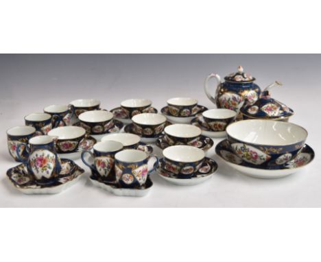 Approximately thirty three pieces of first period Worcester teaware, c1770, decorated with fan shaped panels containing Europ