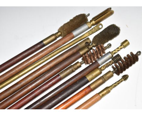 Ten vintage shotgun cleaning rods including one with brass shaft and turned wooden handle.&nbsp;