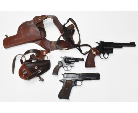 Three blank firing pistols and revolvers BBM Bruni 8mm, Precise 880 and one other revolver, two in leather holsters.&nbsp;