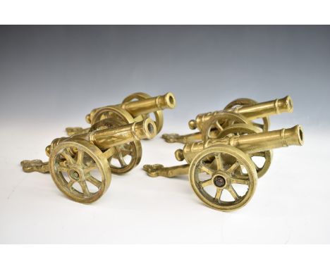 Set of four model cannon with brass barrels and carriages, bearing date 1812 to barrels, length 28cm
