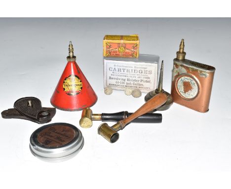 A collection of gun and shooting related accessories including shot or powder measures, Smith &amp; Wesson K series wooden re