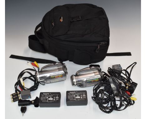 Four Panasonic VDR-D310 video camcorders, in two backpacks with instructions, chargers, accessories etc together with a Sony 
