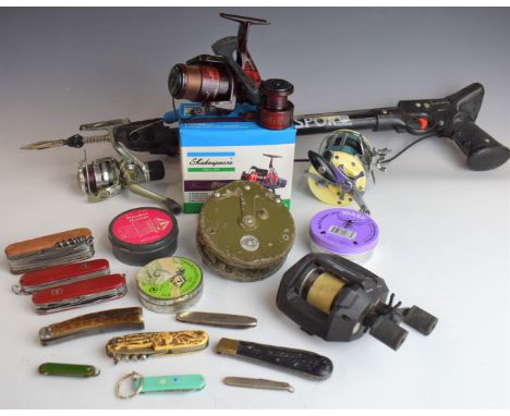 Vintage fishing tackle including Mitchell 600 multiplier, Abu Ambassadeur, vintage spear fishing gun, tins of air rifle pelle