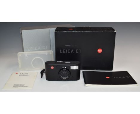 Leica C1 camera, with 38-105 lens, in original box with travel case, manual and warranty card, serial number of camera 271901