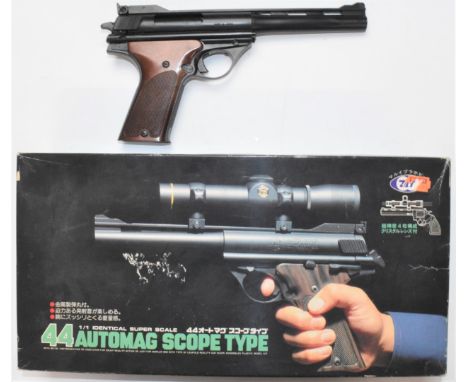 Auto Mag Scope Type .44 AMP Model 180 replica pistol, in original box with scope, accessories and related paperwork.&nbsp;