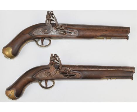A pair of flintlock pistols each with lock stamped 'Tower' and with crown over 'GR' cypher, line inlaid hammer, brass trigger
