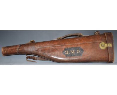 Vintage leather leg of mutton shotgun carry case with brass lock, 79cm long.&nbsp;