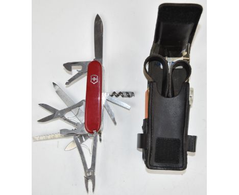 Victorinox officer's Swiss Army knife with fifteen blades/tools together with pack containing compass, sharpener and pencil,&