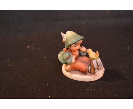 A Hummel Figurine 'Singing Lesson'