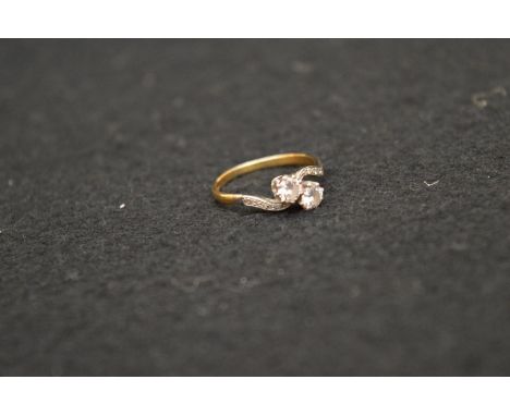 A Superb 18ct Gold and Platinum Two Diamond Twist Ring with Diamond Set Shoulders 