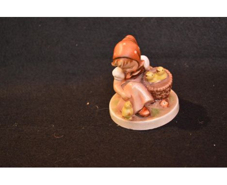 A Hummel Figurine 'The Chick Girl'