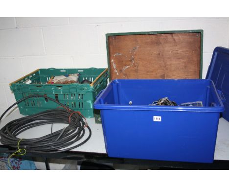 A WOODEN TOOLBOX AND TWO PLASTIC TRAYS CONTAINING mallets, hatchets, jump leads, blow lamp and a length of armoured cable