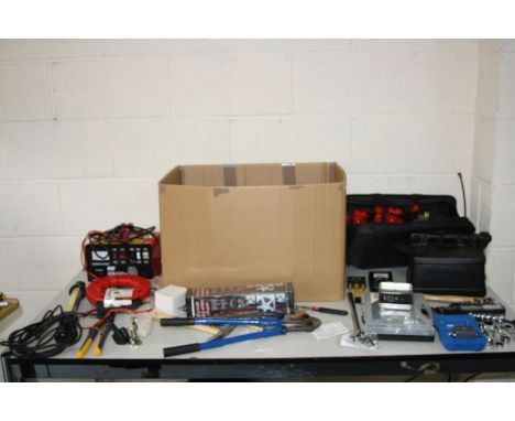 A BOX CONTAINING AUTOMOTIVE AND OTHER TOOLS including battery charger, a car tidy emergency kit, inspection lamp, spanners, e