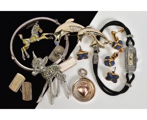 A SELECTION OF ITEMS, to include a silver bangle with engraved detail and hallmark for Birmingham, diameter 50mm, a round sil