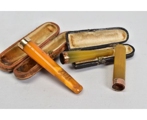 THREE CHEROOT HOLDERS, the first a cased yellow Bakelite cheroot mounted with a 12ct gold Birmingham hallmark, length 7cm tog