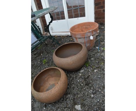TWO GRADUATING TERRACOTTA GARDEN POTS with rounded top edge, together with another garden planter (3)