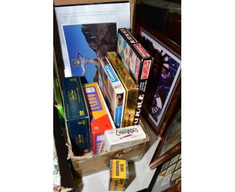 A BOX OF GAMES AND TWO PICTURES to include Trivial Pursuit, Taboo, Connect 4, Sexual Trivia the Golden Edition, Rat Race, Cha