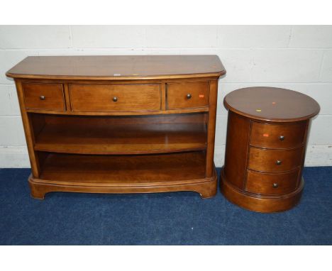 A WILIS AND GAMBIER CHERRYWOOD BOWFRONT BOOKCASE/SIDE UNIT with three various deep drawers, width 121cm x depth 45cm x height