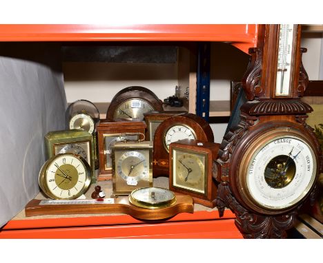 A GROUP OF NINE CLOCKS AND A CONTEMPORARY 'SHORTLAND MANCHESTER' WHEEL BAROMETER, including a dome topped mantle clock, Westc