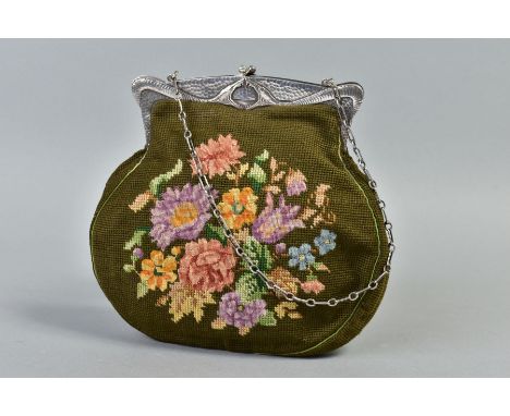 HERPETOLOGICAL INTEREST, an early 20th Century petit point and tapestry bag with a Sterling silver clasp, the front cast as t