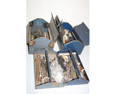TWO METAL TOOL BOXES and contents including chisels, spanners, squares, clamps and a box of camera cases,  etc