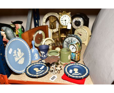 A GROUP OF COLD PAINTED METAL DOGS STANDING UNDER AN UMBRELLA, with ten mantle clocks, including Smiths, English Clock System