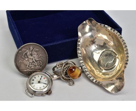 A SELECTION OF ITEMS, to include an 1894 Victoria coin, a white metal serving spoon inset with George V coin, a wristwatch fa