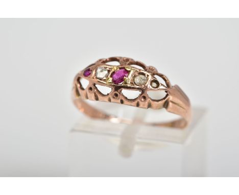 A 9CT GOLD FIVE STONE RING, designed with circular cut rubies interspaced by one single cut and one rose cut diamond within a