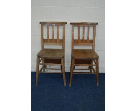A PAIR OF EARLY 20TH CENTURY ELM AND BEECH CHAPEL CHAIRS, with kneeling stool and brass plaque to top rail