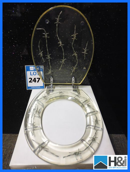 Novelty Barbed Wire Clear Resin Toilet Seat. Typical RRP 49