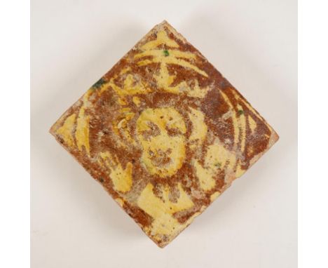 A MEDIEVAL GLAZED POTTERY TILE, decorated with the facing portrait of a King with both hands raised, possibly Edward VI. 115m