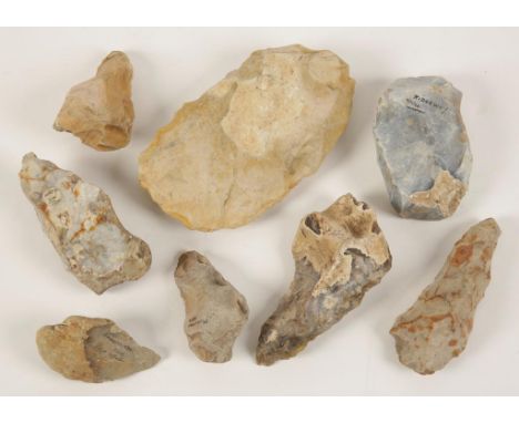 A COLLECTION OF LARGE KNAPPED FLINT TOOLS, mostly with labels or inscribed, including "Devenis 1924".